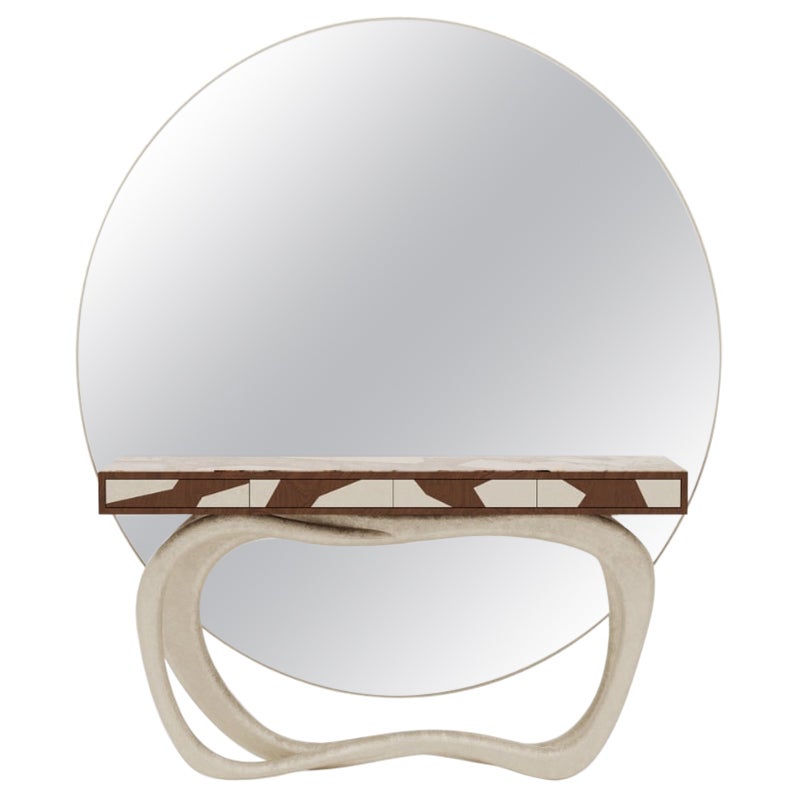The Valdés Peninsula has been listed as a UNESCO World Heritage Place for its global significance as a site for marine animal conservation, where its shape and crystal-clear water served as the inspiration for this unique console. An enormous round
