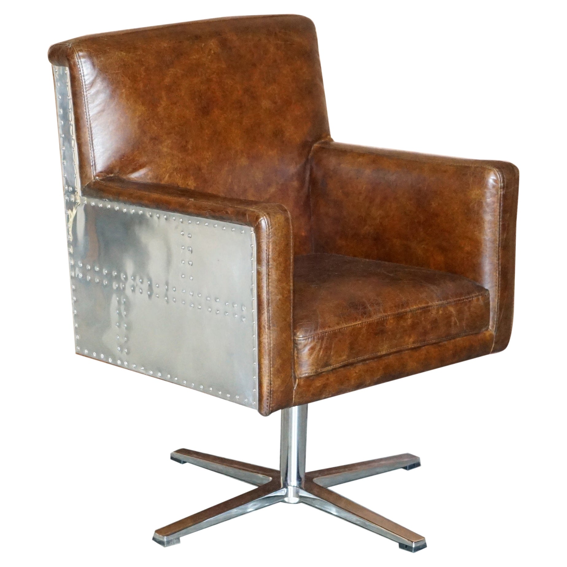 1 of 2 Hand Dyed Brown Leather Aviator Hammered Metal Swivel Captains Armchairs For Sale