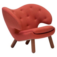 Finn Juhl Pelican Chair Upholstered in Red Kvadrat Remix Fabric