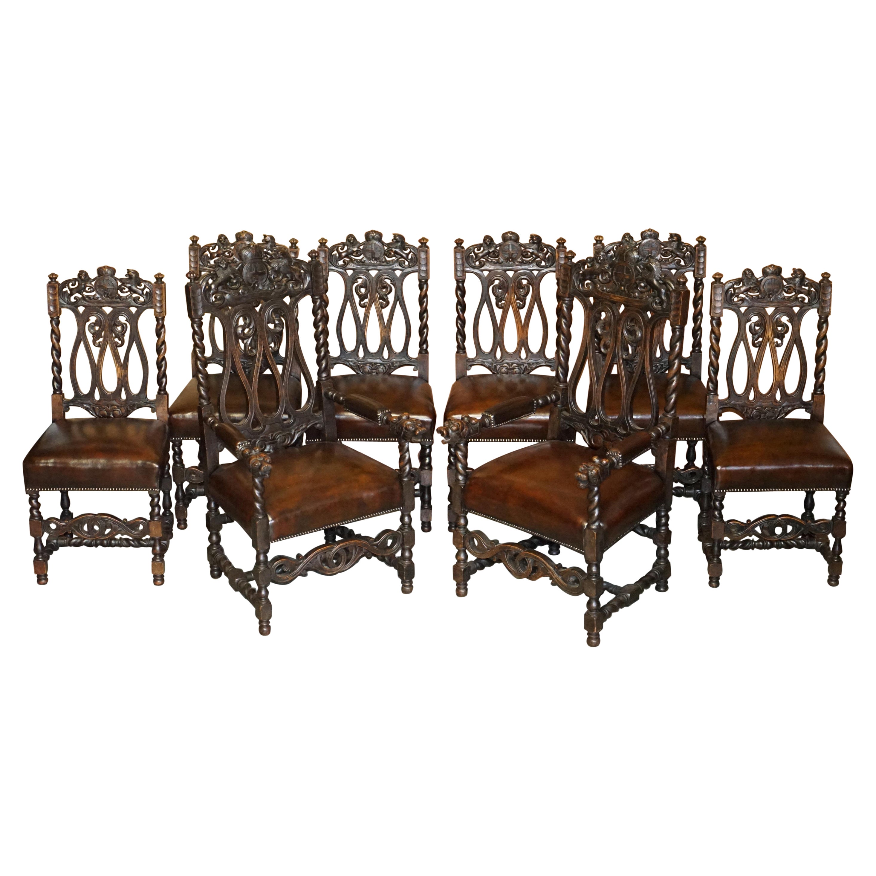 Eight Hand Carved Armorial Crest Coat of Arms Antique Jacobean Dining Chairs For Sale