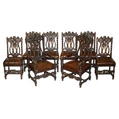 Eight Hand Carved Armorial Crest Coat of Arms Antique Jacobean Dining Chairs