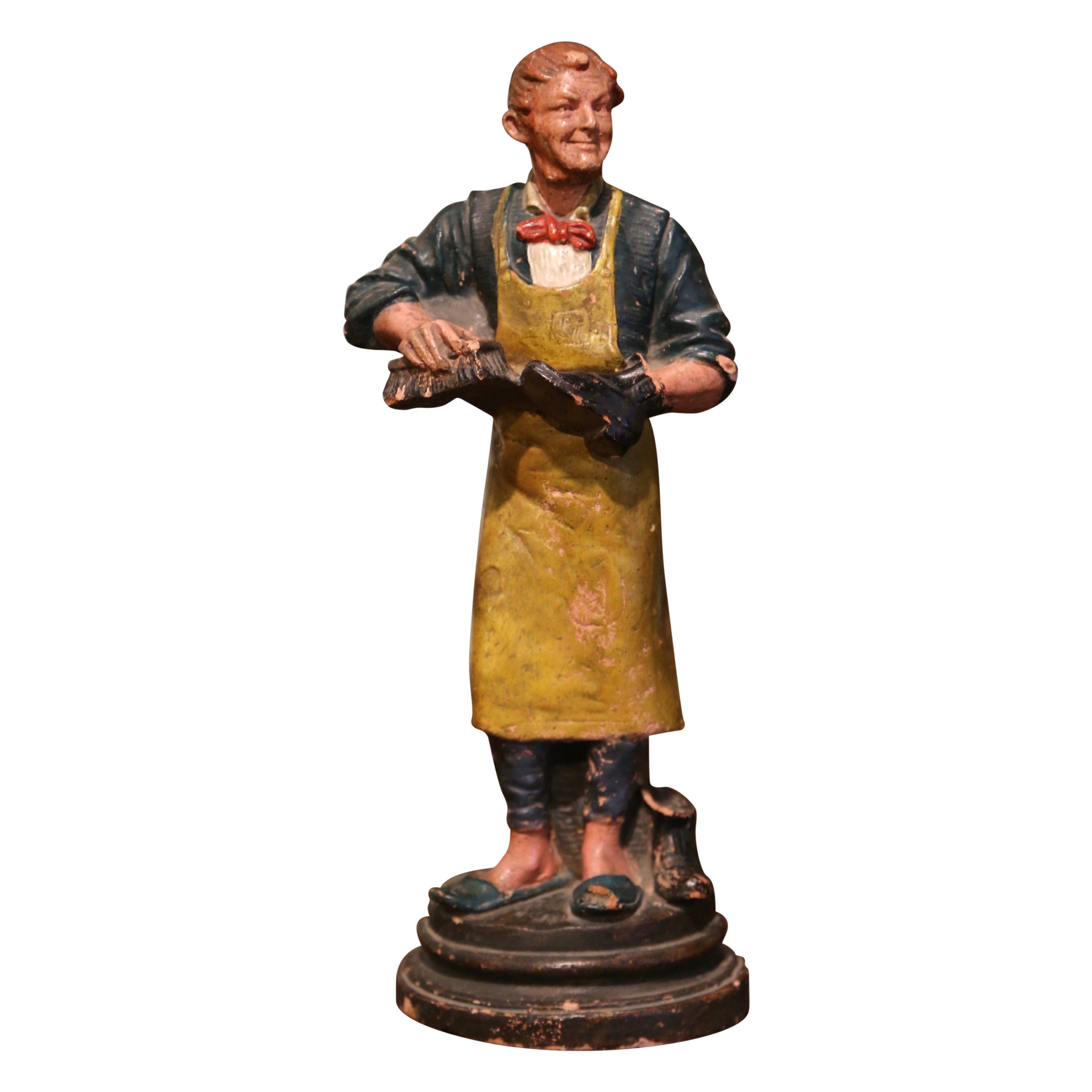 Figurine de cordonnier en terre cuite peinte à la main et datant du 19e siècle en vente