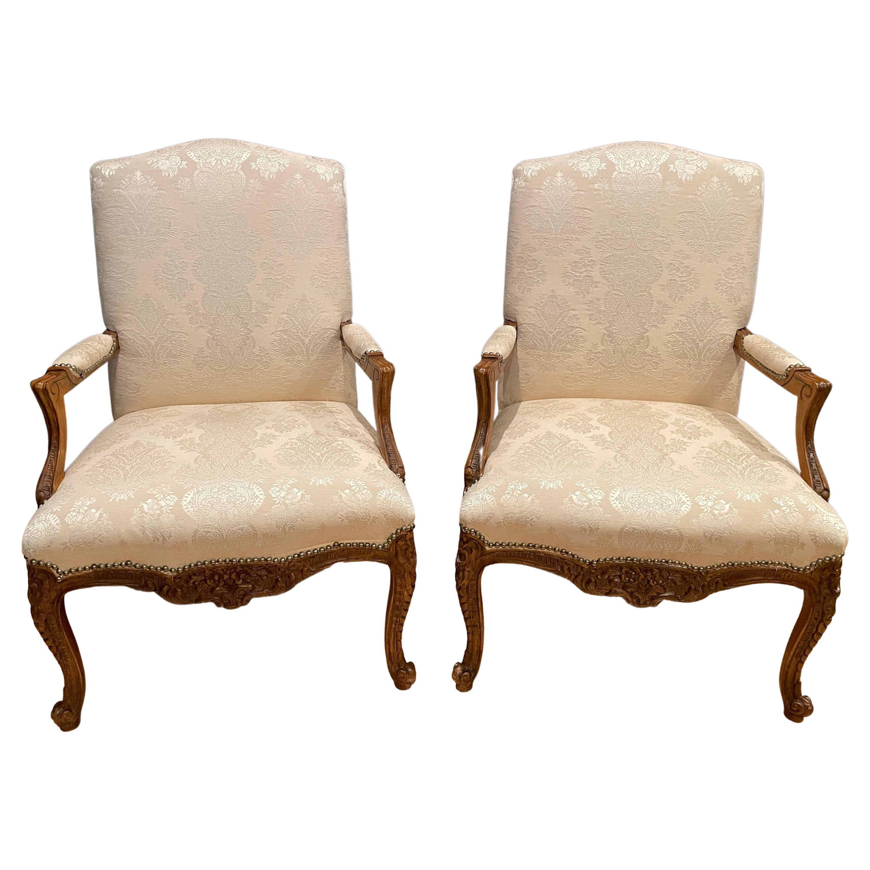 Pair of Louis XV Carved Walnut Fauteuils