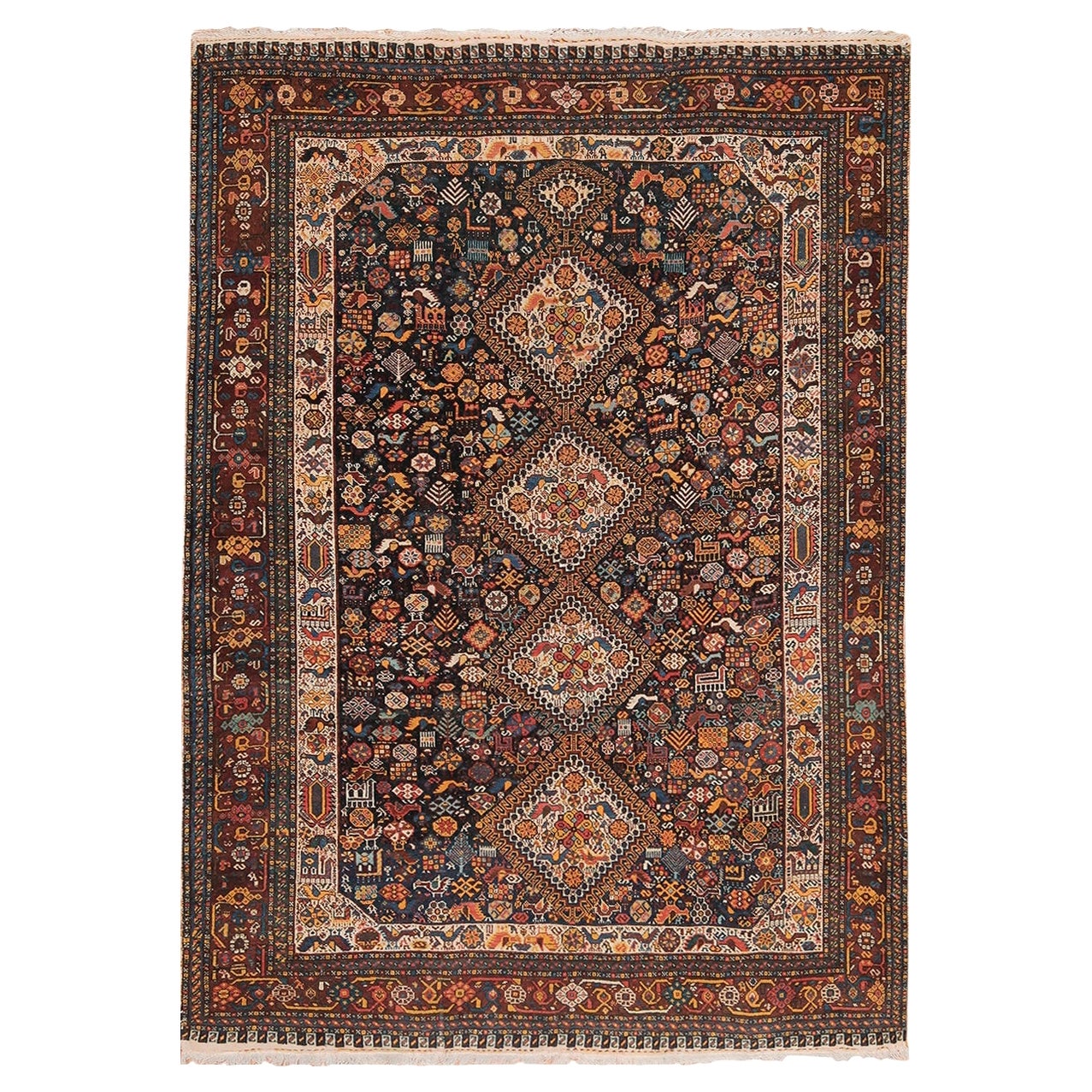Tribal Antique Persian Qashqai Rug. Size: 4 ft 7 in x 6 ft 3 in (1.4 m x 1.9 m)