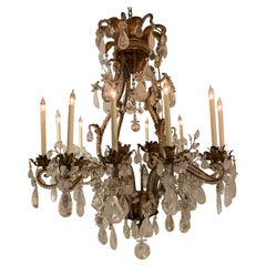 Exceptional Large Rock Crystal Chandelier, 12 Lights with Scrolling Bronze Cage