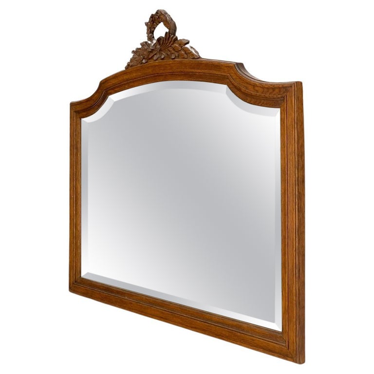 Antique Oak Carved Figural Beveled Glass Horizontal Wall Mirror For