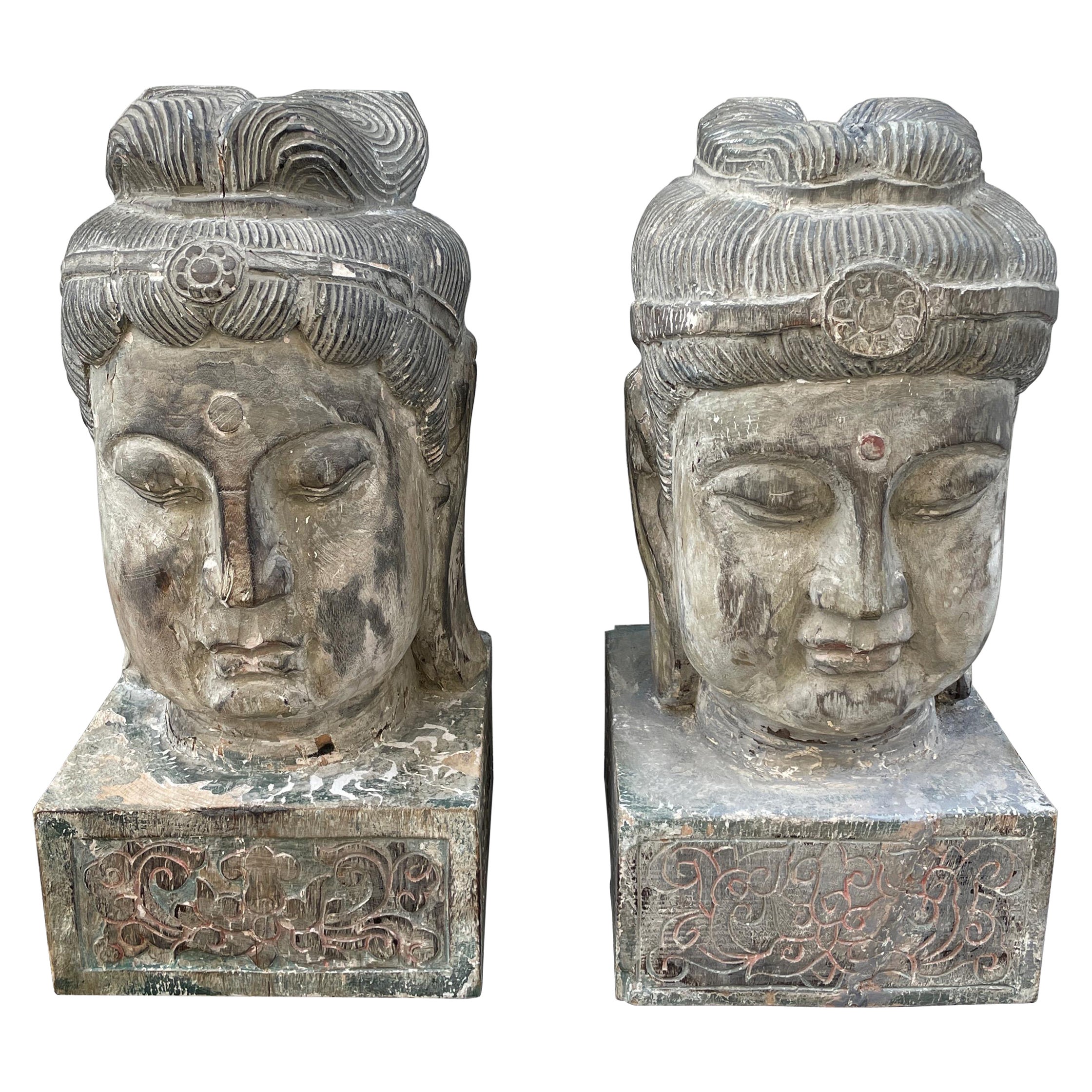 Pair of Carved Wood Buddha Head Sculptures