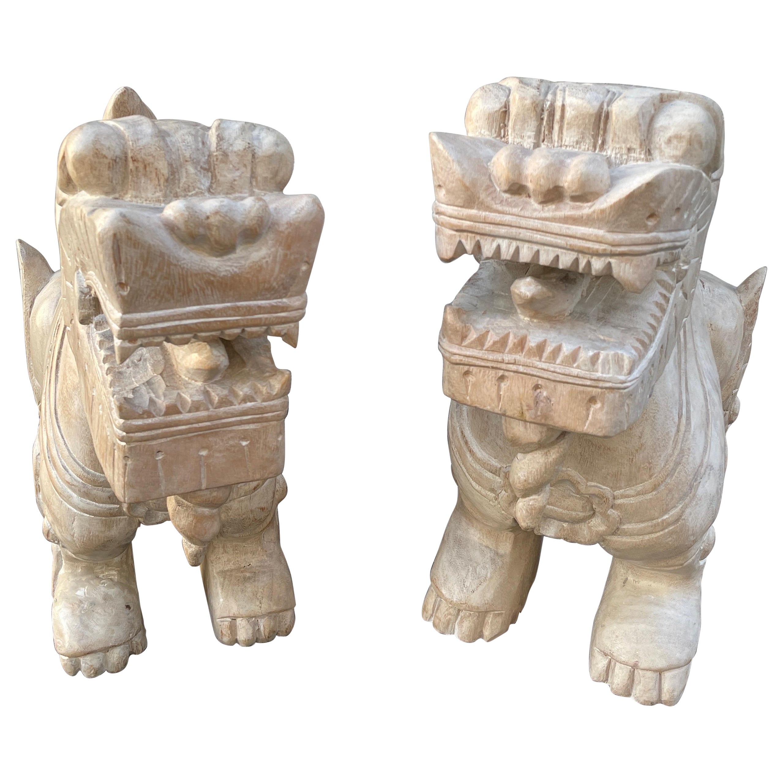 Pair of Large Carved Wood Foo Dogs For Sale