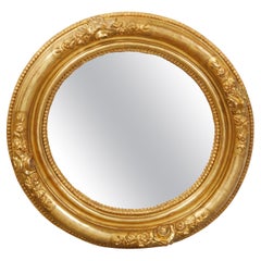 English 19th Century Round Giltwood Mirror with Carved Flowers and Etched Motifs