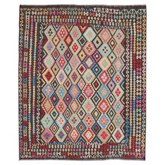 Bunter Flachgewebter Kelim-Teppich mit Schokoladenbraun und hellen mehrfarbigen Farben, Stammeskunst