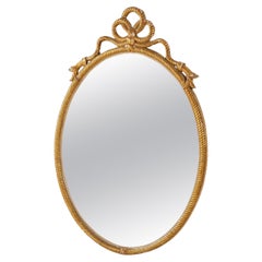 Antique Early 20th Century Giltwood Rope-Twist Oval Mirror by Harris Interior Arts Inc. 