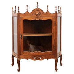 Used French Louis XV Style Walnut Display Cabinet with Carved Musical Instruments