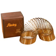 Retro 50th Anniversary Gold-Plated Slinky Toy in Wood Box