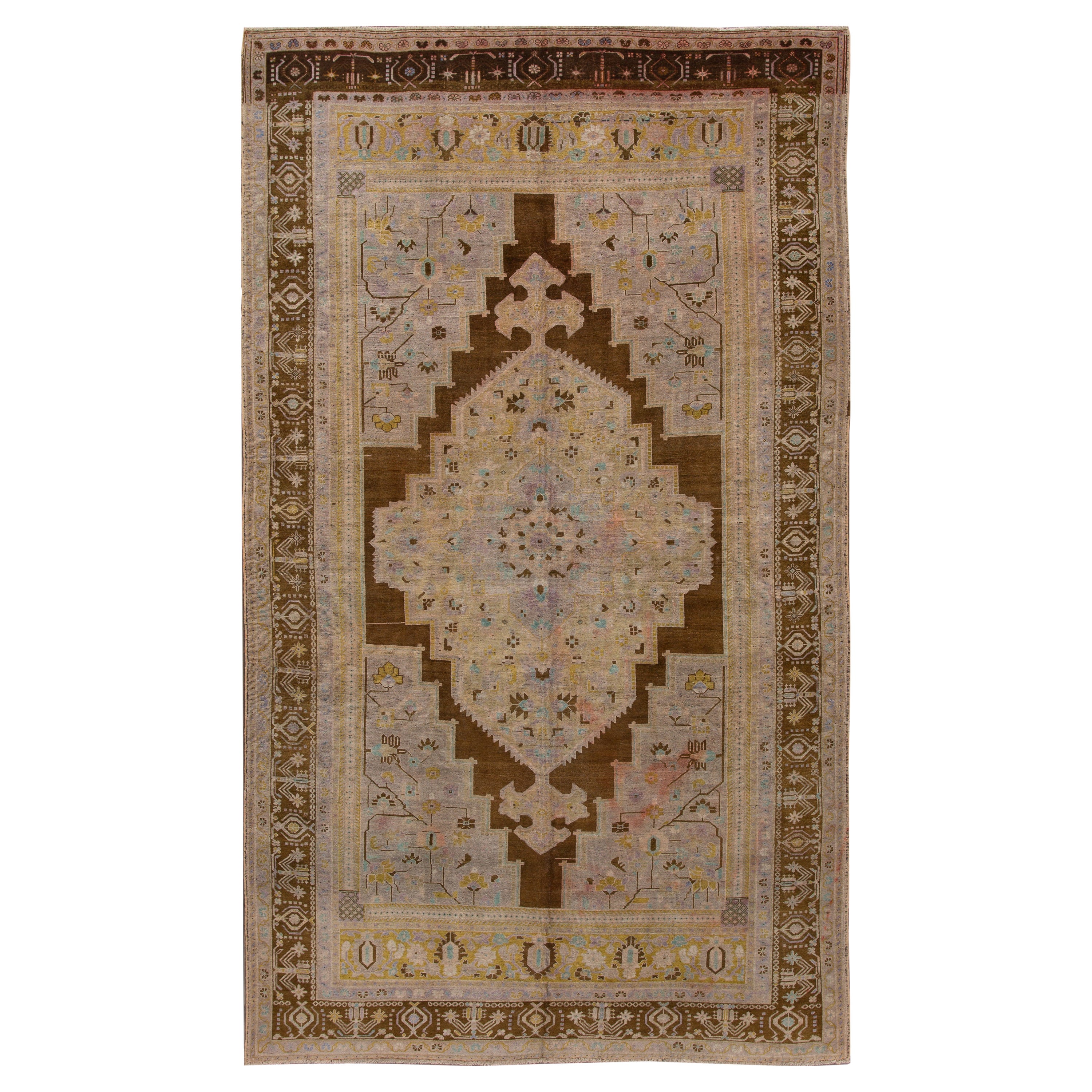 Antique Khotan Handmade Medallion Floral Motif Tan Room Size Wool Rug For Sale