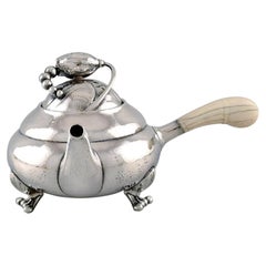 Antique Georg Jensen Blossom Teapot in Hammered Sterling Silver with Ivory Handle
