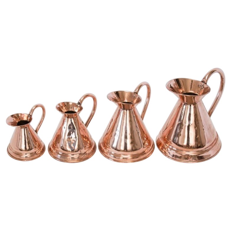 Set of 4 English Copper Graduated Haystack Pitchers Jugs Measures, circa 1900 For Sale