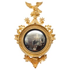 Miroir mural continental doré du début du XIXe siècle
