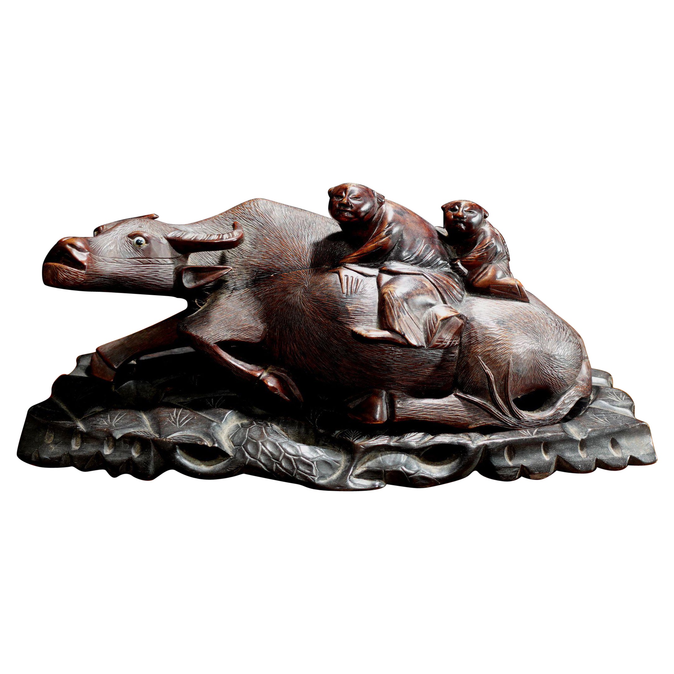 Japanese/Chinese Carved Buffalo and Boys on the Fitted Base For Sale