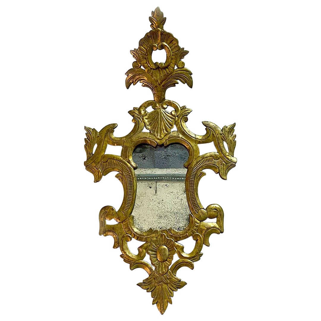 Miroir baroque italien en verre mercuré avec cadre en bois doré, années 1700