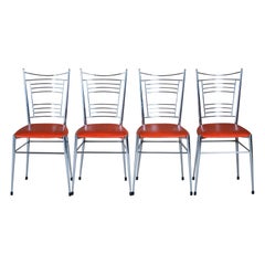 Set of 4 Mid Century Chrome and Vinyl Dining Chairs with Original Red Upholstery