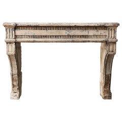 Very Unique French Limestone Fireplace in Louis XVI Style with Obelisque Legs