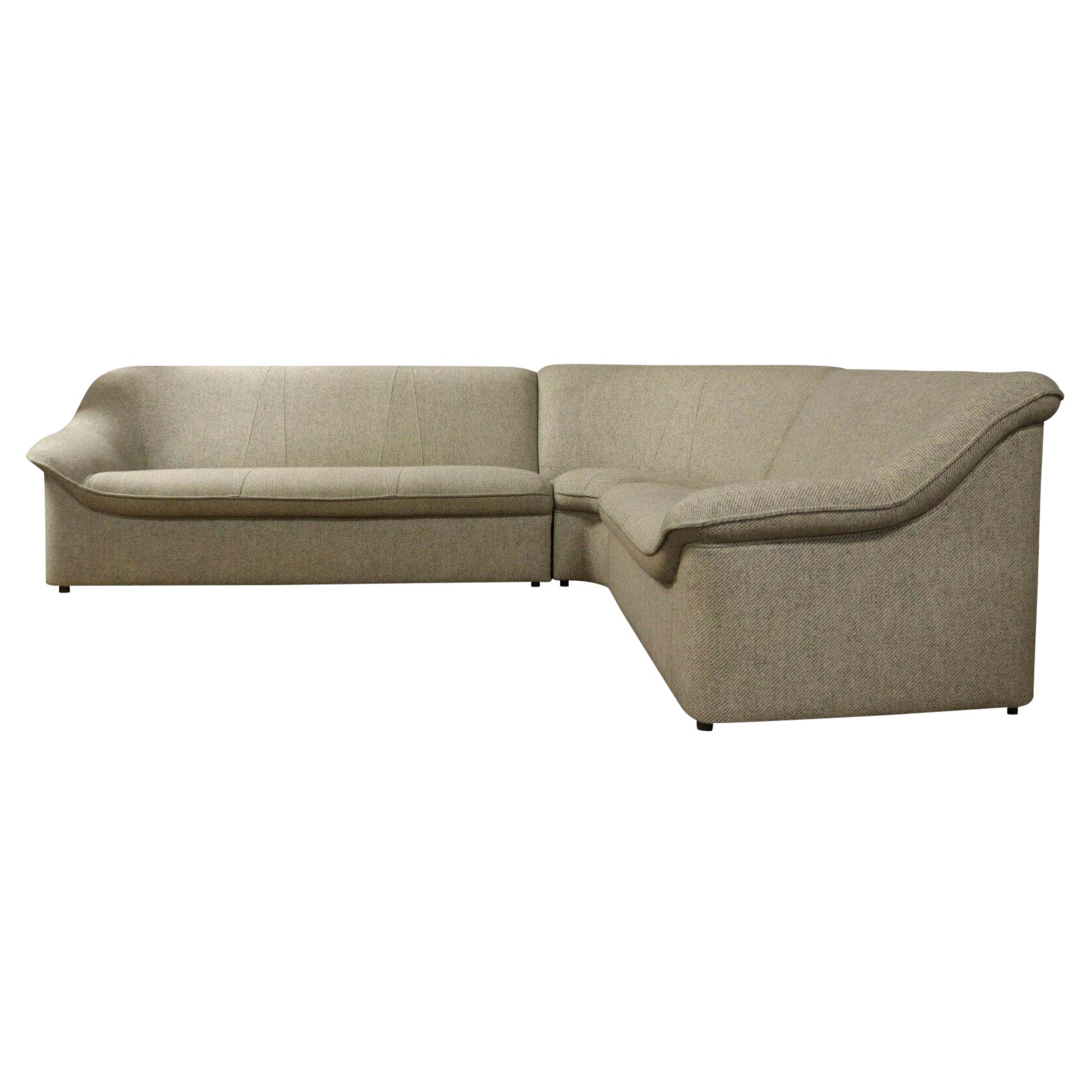 Stunning 3-piece sectional sofa by Bramin Mobler, formerly known as N. A. Jorgensen is well known for making iconic Danish furniture of the highest quality. This sofa features a modern twill, neutral upholstery in very good condition with stitch