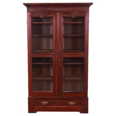Antique Victorian Eastlake Carved Walnut and Burl Wood Bookcase, circa 1880s