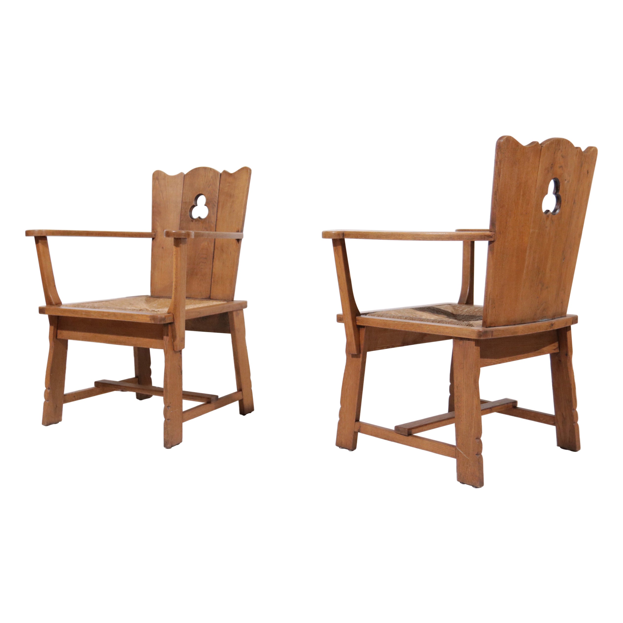 Story Book Pair of Dutch Brutalist Oak and Rush Throne-Like Lounge Chairs For Sale