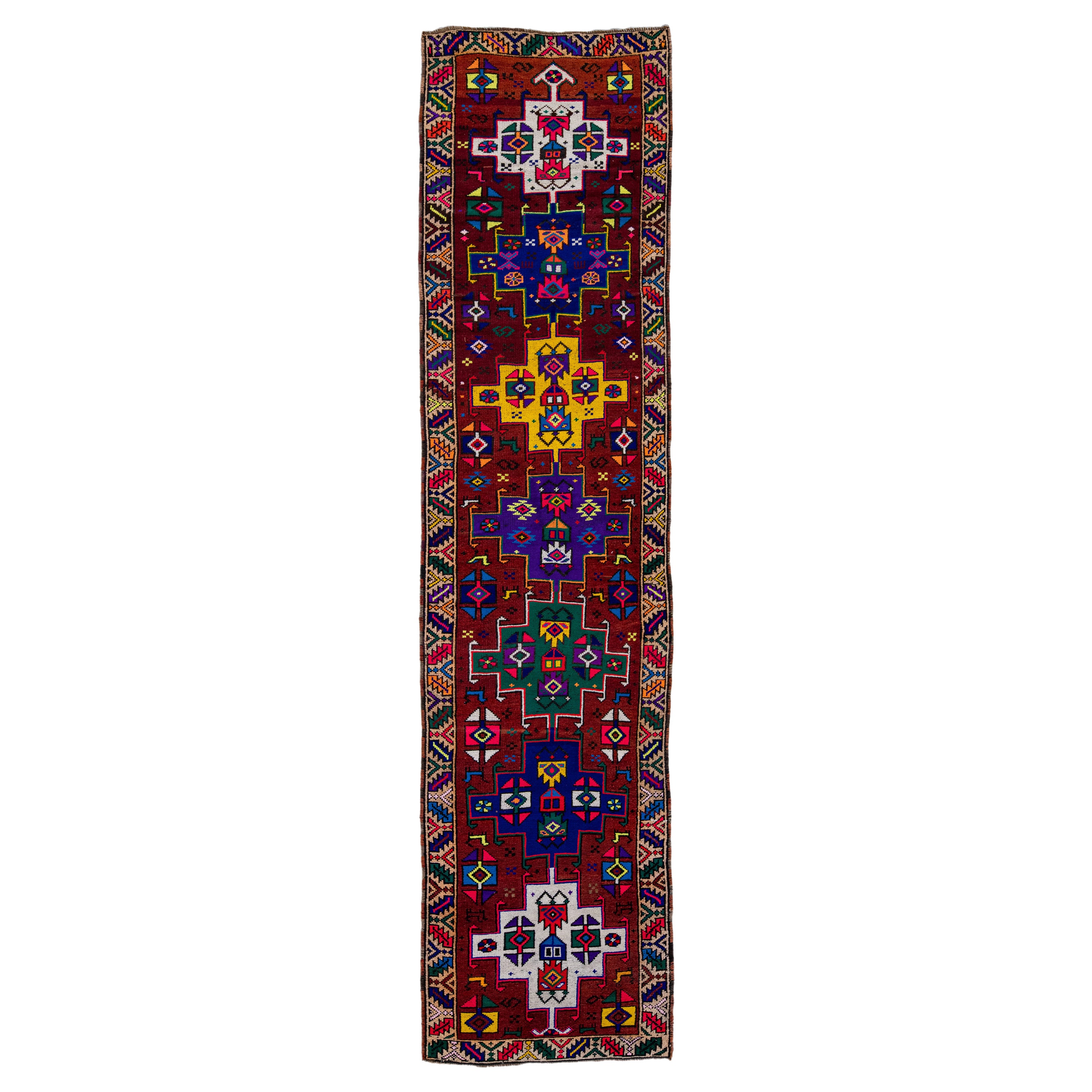 Vintage Turkish Handmade Multicolor Tribal Pattern Burgundy Wool Runner For Sale