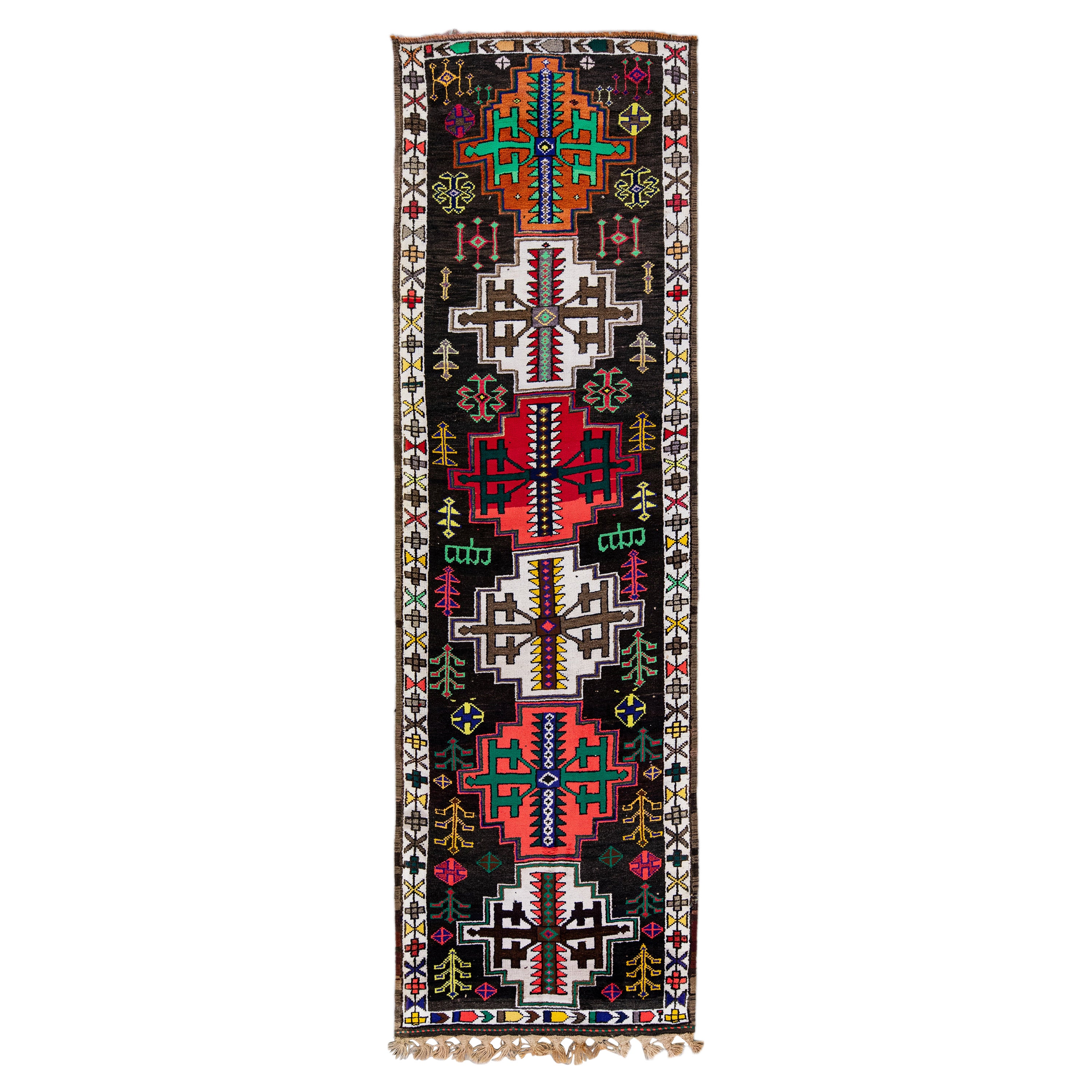 Vintage Brown Turkish Handmade Multicolor Tribal Pattern Wool Runner For Sale