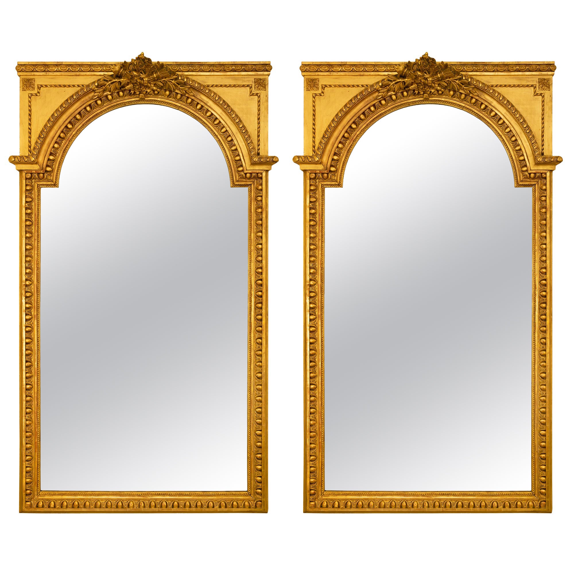 Pair of French Mid-19th Century Louis XVI Style Giltwood Mirrors For Sale