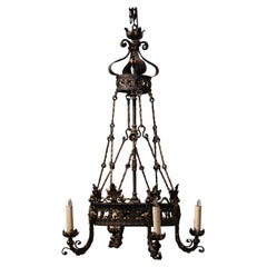 Lustre à quatre lumières en fer forgé gothique français du XIXe siècle, noir et doré