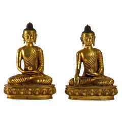 Pair of Gilt Bronze Buddha
