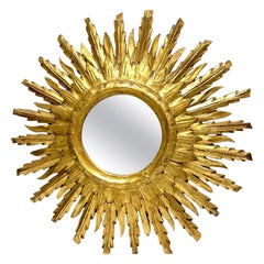 Superbe grand miroir en étoile en bois doré, France, vers les années 1920.