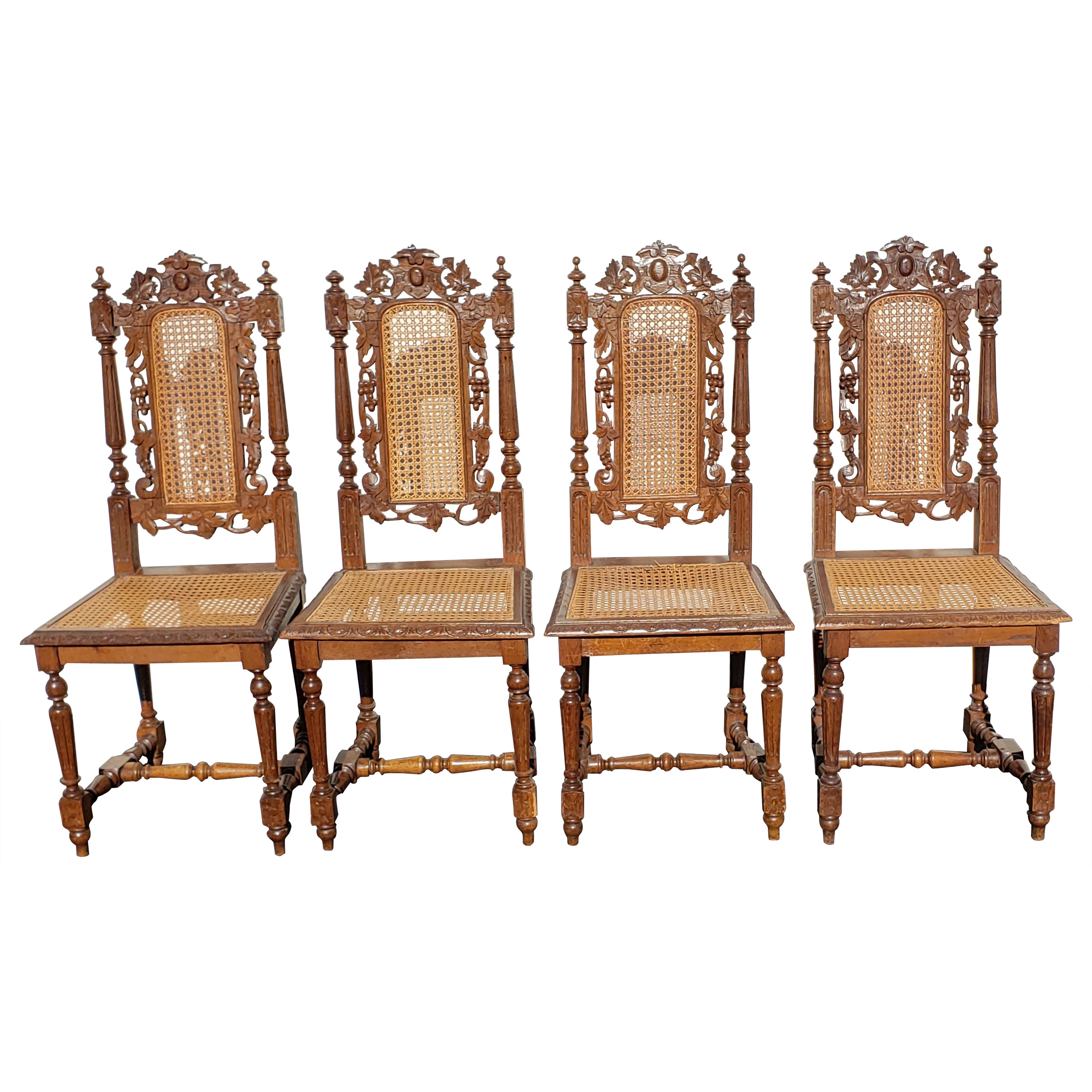 Antique Hand Carved Jacobean Oak and Cane Dining Chairs, Circa 1910s, a Set For Sale