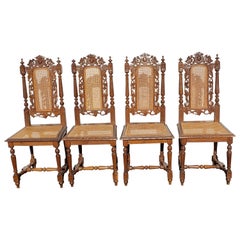 Antique Hand Carved Jacobean Oak and Cane Dining Chairs, Circa 1910s, a Set