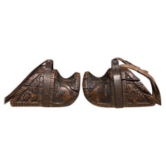 Pair of 19th Century Spanish Colonial Carved Wood and Iron Stirrups