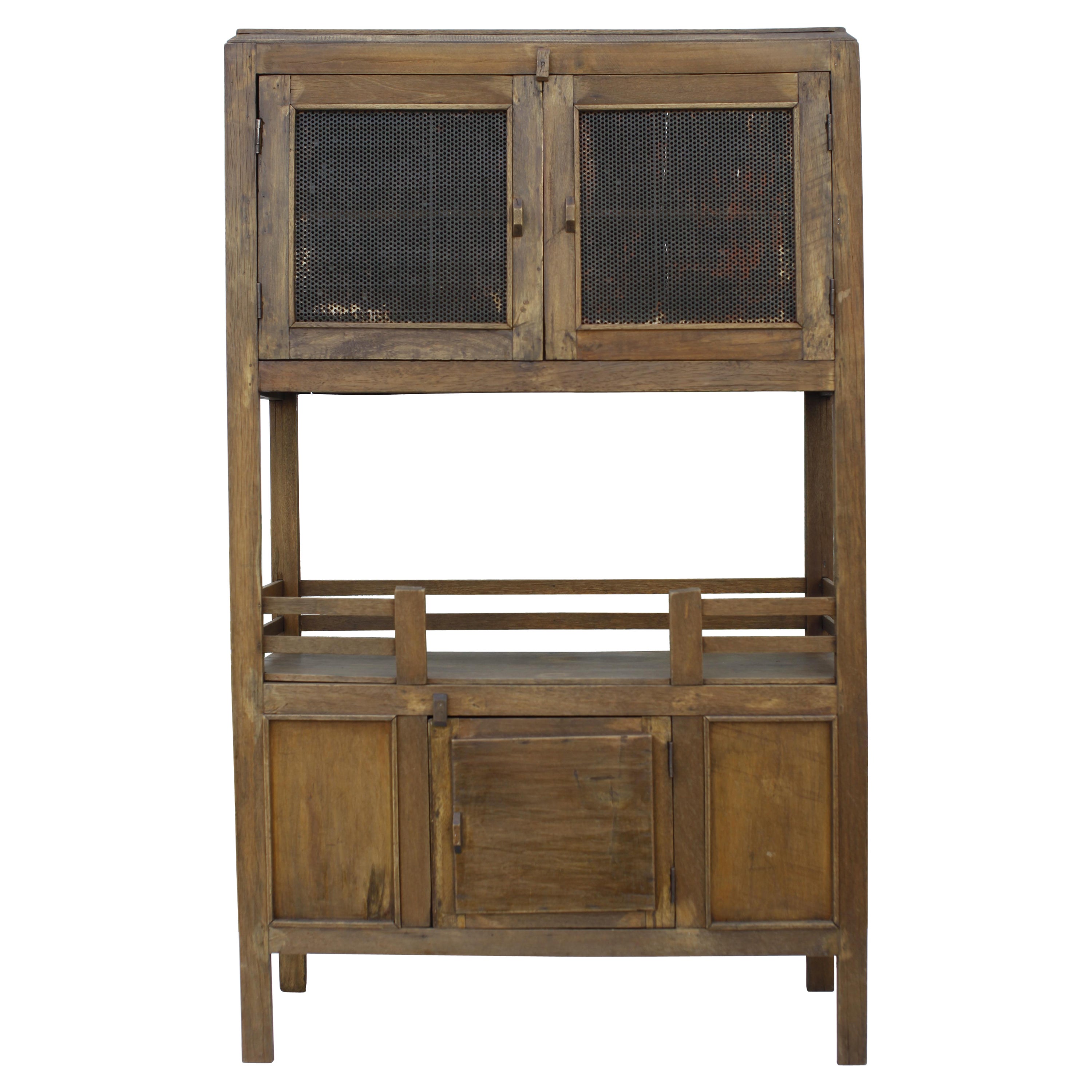 French Colonial Weathered Teak Cabinet with Metal Screen Doors 1930's For Sale