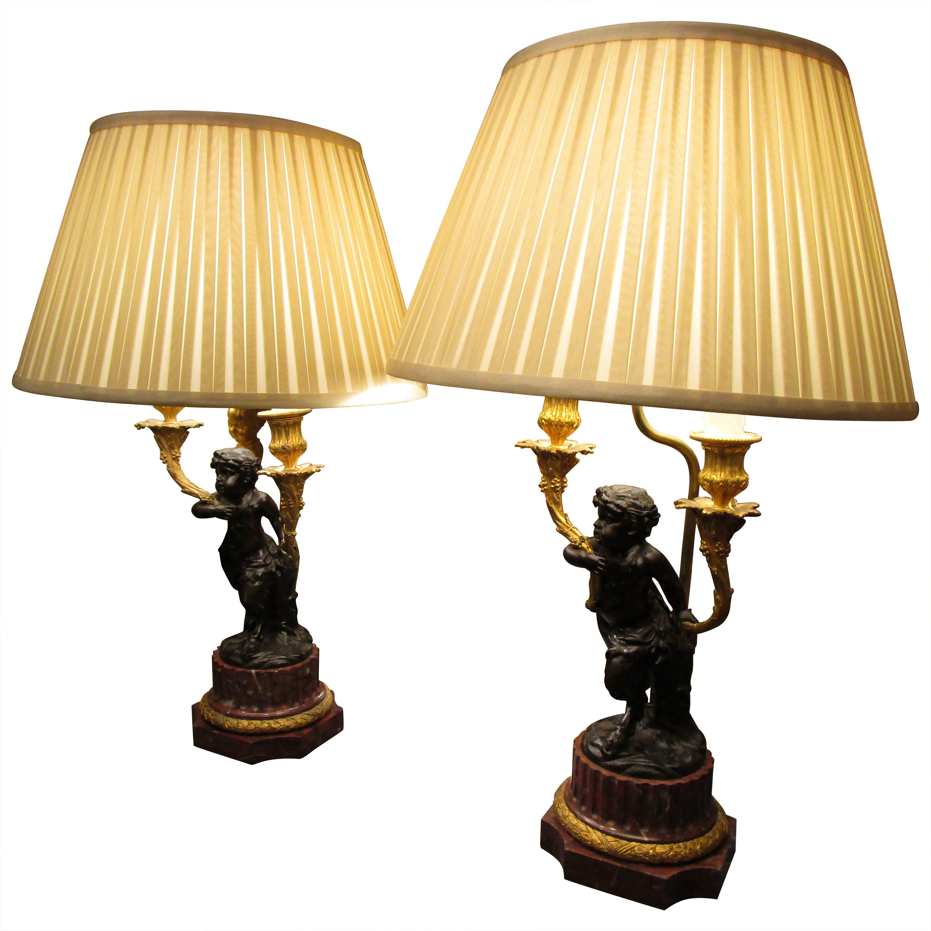 Fine Pair of French Patinated Bronze and Gilt Bronze Cherub Candelabra Lamps For Sale
