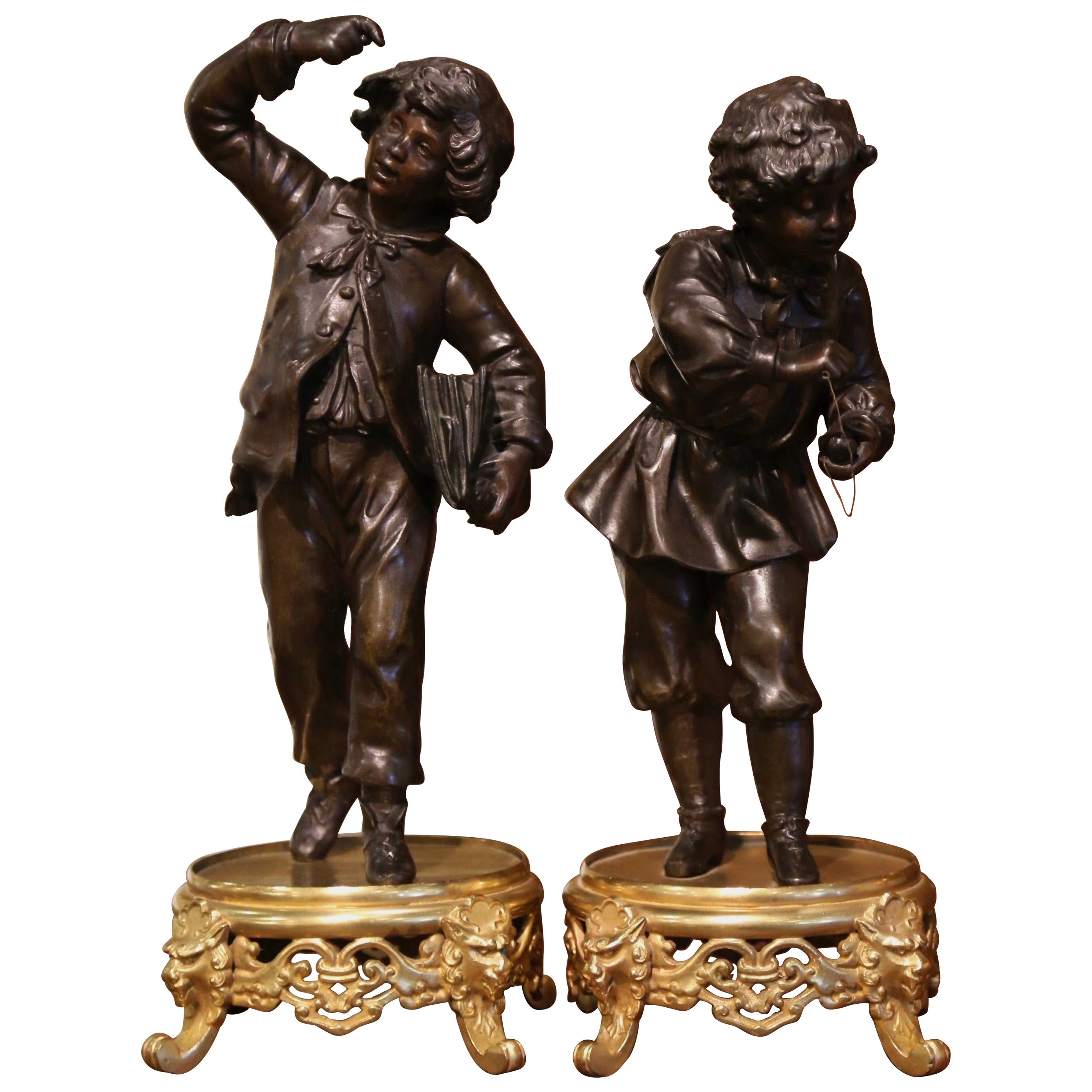 Pair of 19th Century French Spelter and Bronze Boy Figurative Sculptures For Sale