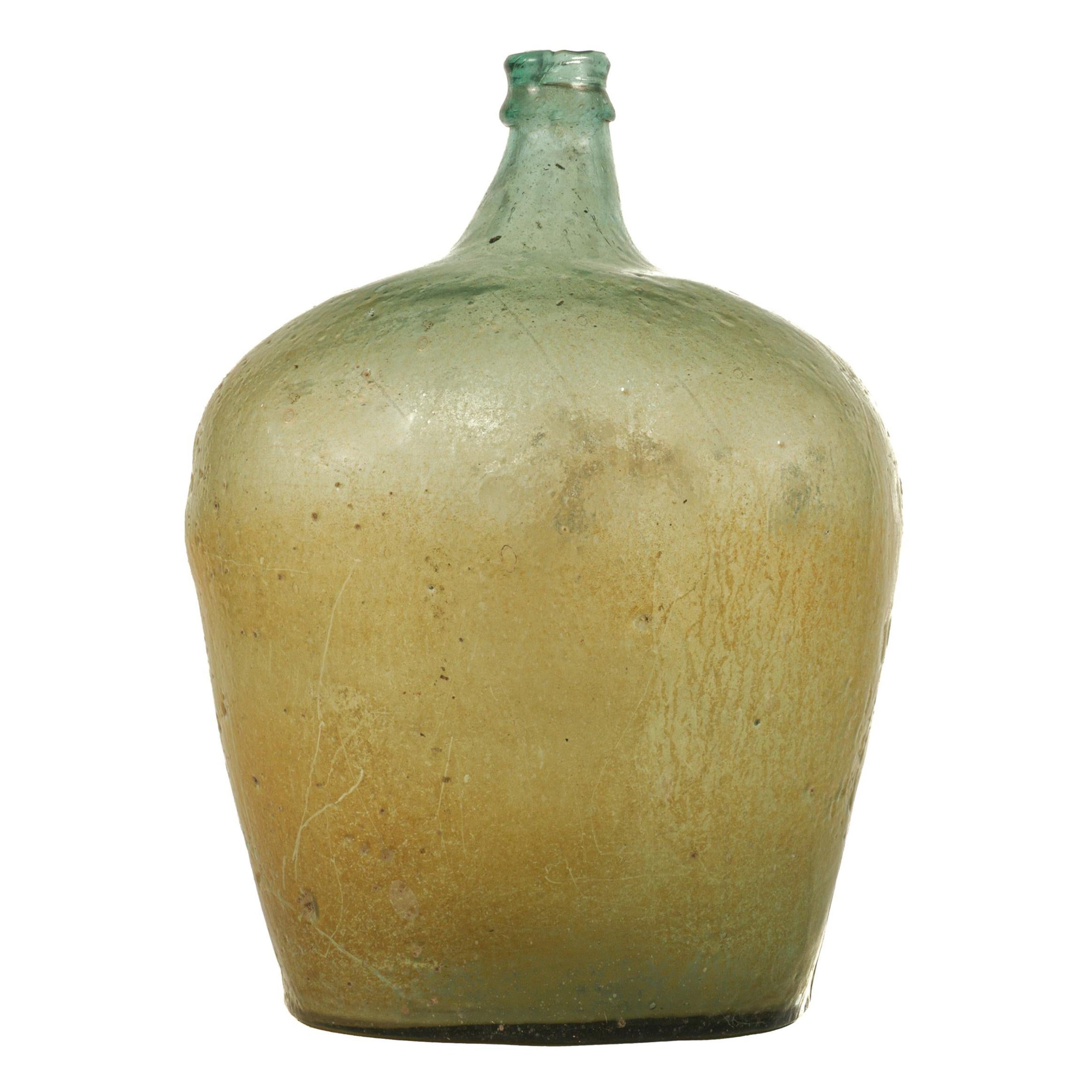 Demijohn en verre soufflé vert de la fin du 19e siècle provenant du sud du Mexique en vente