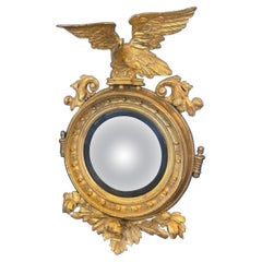 Early 19th Century Regency Period Gold Gilt Convex Mirror with Eagle on Top