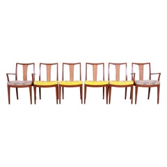 Baker Furniture Mid-Century Modern Sculpted Walnut and Rattan Dining Chairs