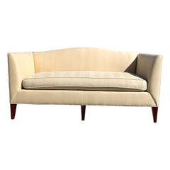 Contemporary Baker Archetype Camelback Sofa in Cream Upholstery