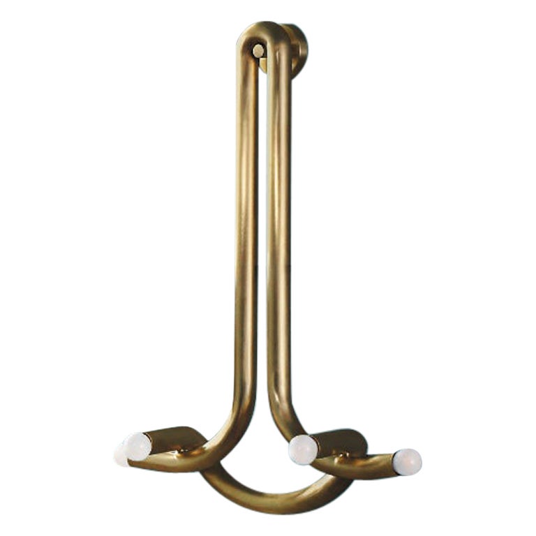 God Sconce in Brass by Paul Matter