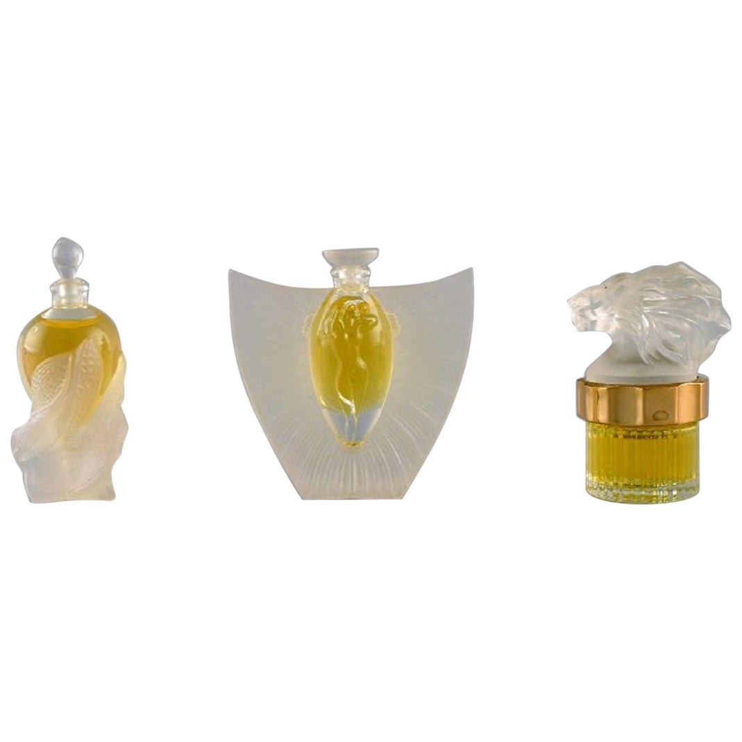 Three Lalique Perfume Bottles, Late 20th Century