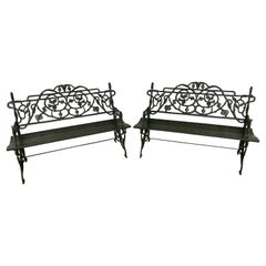 Antique Pair of Early 20th Century Painted Cast Iron Garden Benches with Vine Motifs