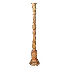 Eighteenth-Century Candlestick in Carved and Gilded Wood