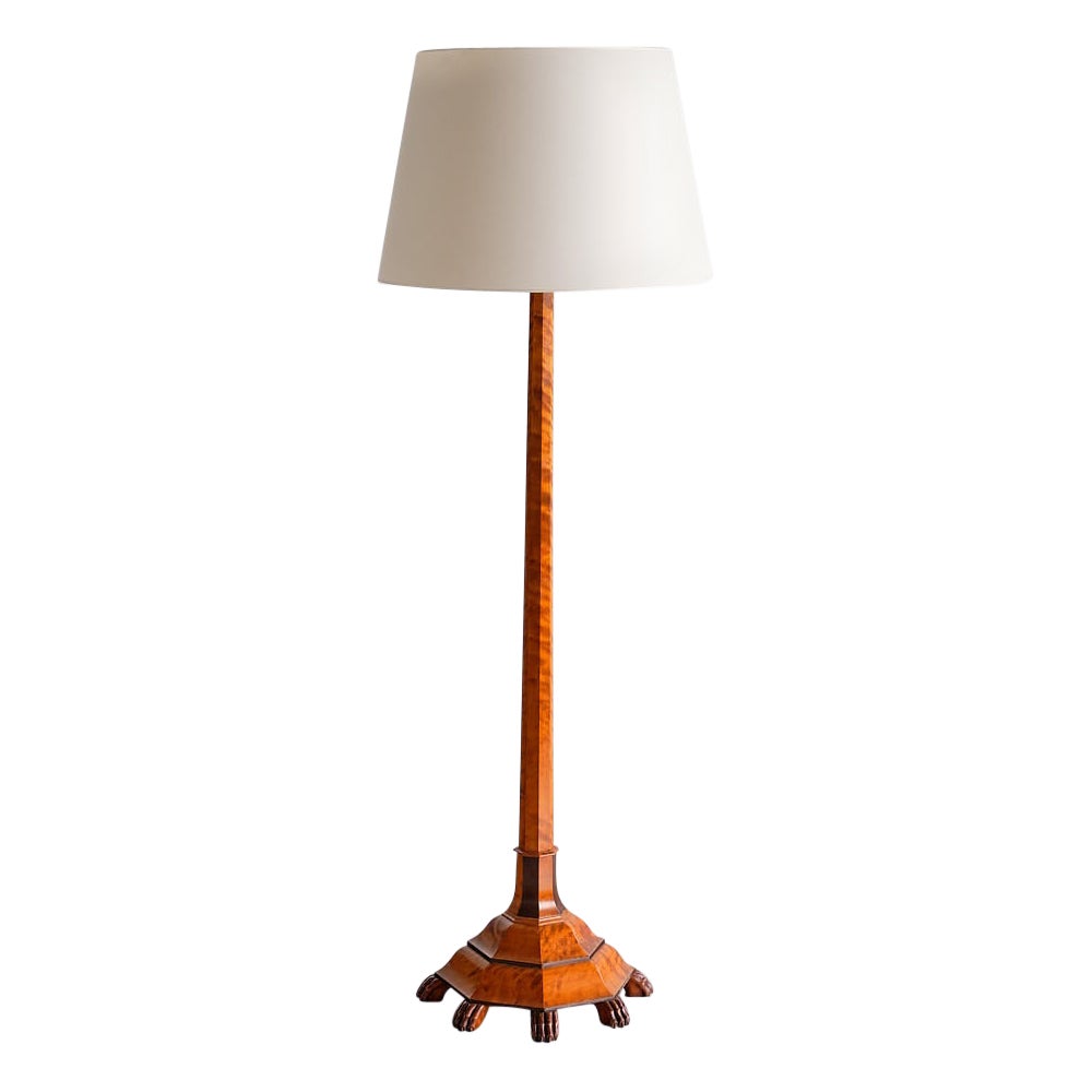 Exceptional Swedish Grace Floor Lamp in Birch with Carved Paw Feet, 1920s For Sale