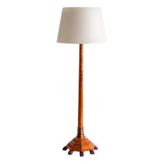 Exceptional Swedish Grace Floor Lamp in Birch with Carved Paw Feet, 1920s